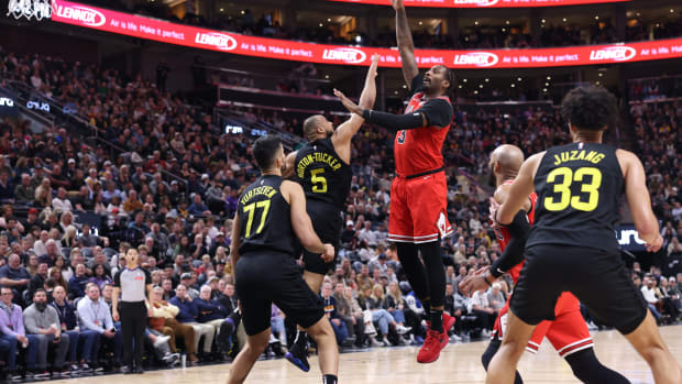 Chicago Bulls center Andre Drummond (3) shoots over Utah Jazz guard Talen Horton-Tucker (5) during the third quarter at Delta Center.